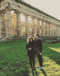 Julie Booth and Kelsey Littlefield in front of the Temple of Poseidon in Paestum in southern Italy.