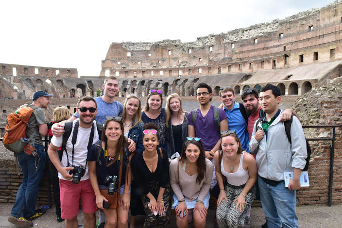 Students explore the inside of the Colosseum.